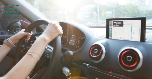 woman driving in the car with GPS up